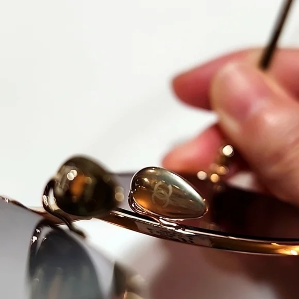 CHANEL Gold and Black Sunglasses - Picture 8 of 14